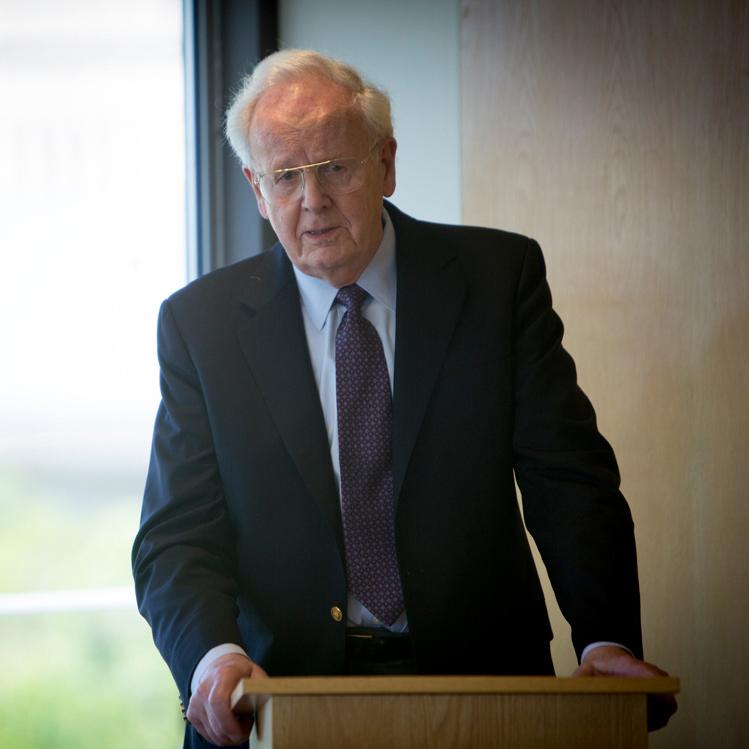 		Walter LaFeber at a podium.
	