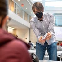 		Michael Reynolds, M.S. ’17, Ph.D. ’21, postdoctoral associate in the Smith School of Chemical and Biomolecular Engineering in the College of Engineering, demonstrated an origami model of a nanobot.
	