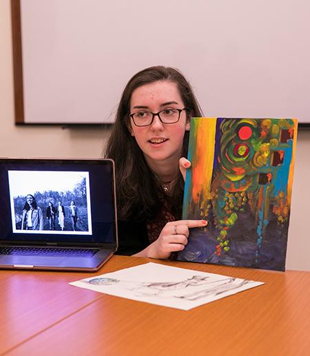 		 Student presenting her art project
	