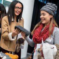 		Warm hats being shared with new Puerto Rican students
	