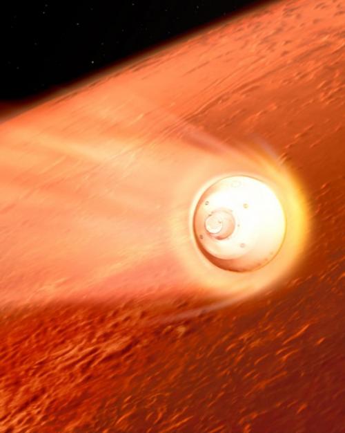 		capsule approaches a red planet
	