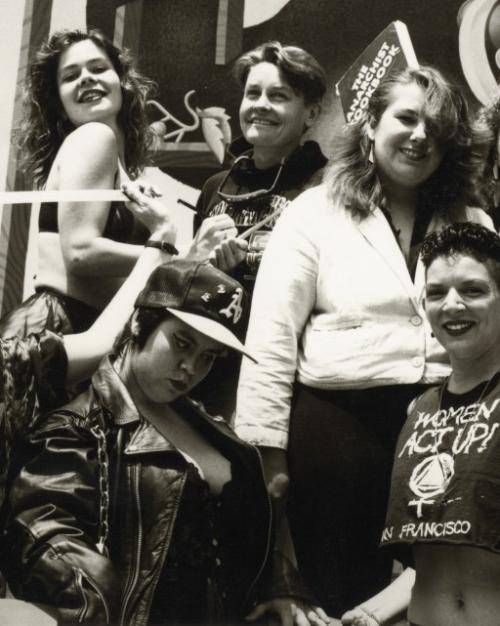 Black and white photo (1984) of a eight people 
