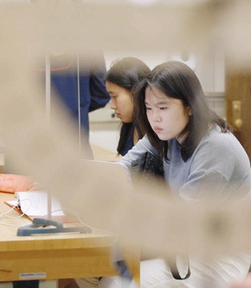  Student working with lab equipment