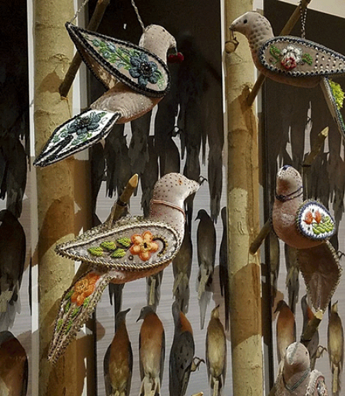 		 Artwork featuring beaded birds
	