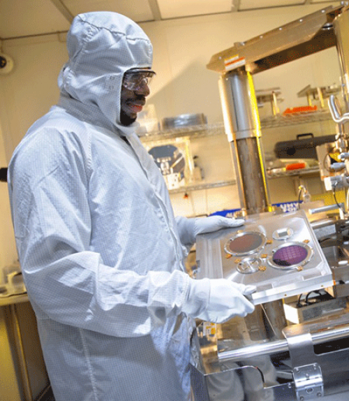 		 A man wearing protective gear in a lab
	