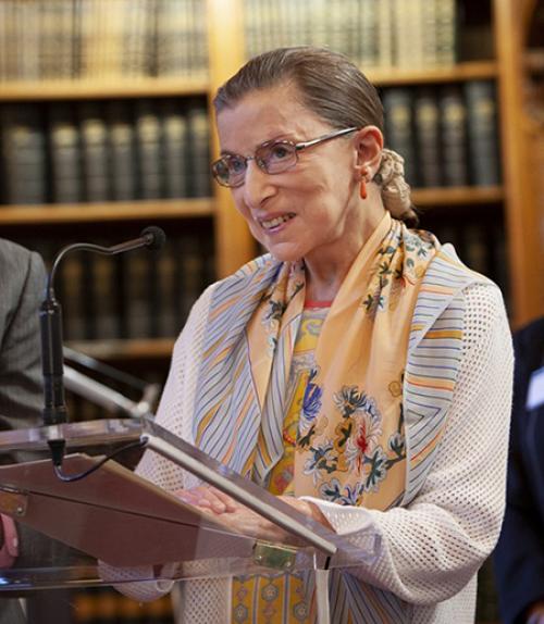 		 Ruth Bader Ginsburg, speaking at a podium
	