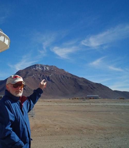 		 Riccardo Giovanelli pointing at site for telescope
	