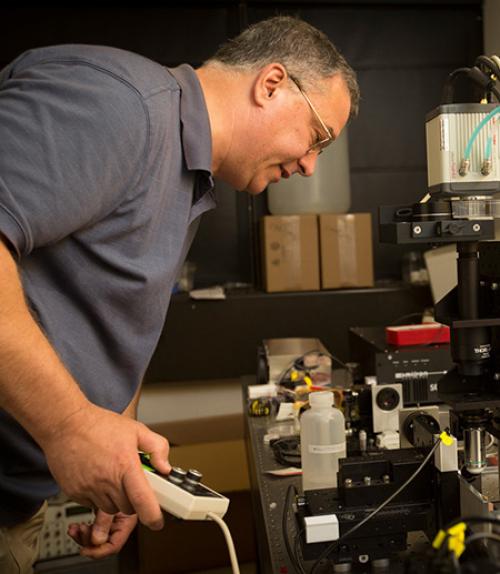		 Professor making new tool
	