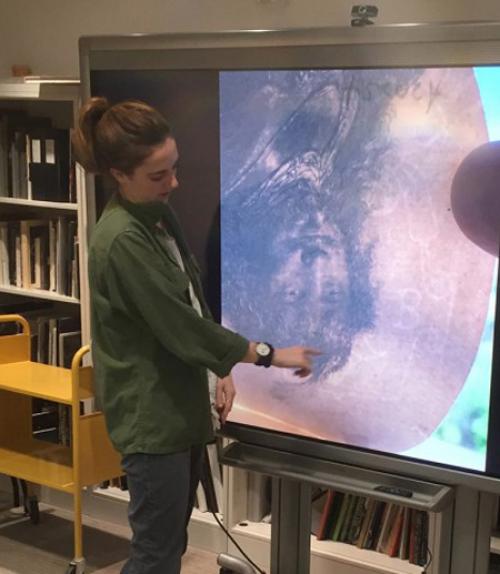 		 Student examining Rembrandt painting
	