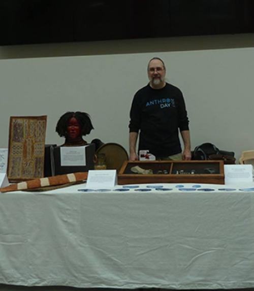  person behind a table