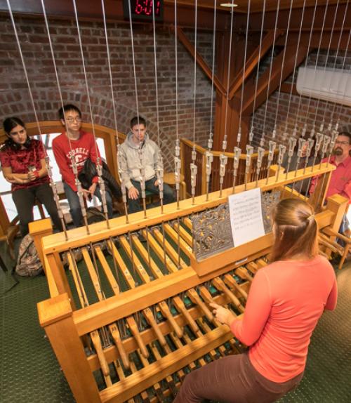 		 Students watch as their chimes compositions are played
	