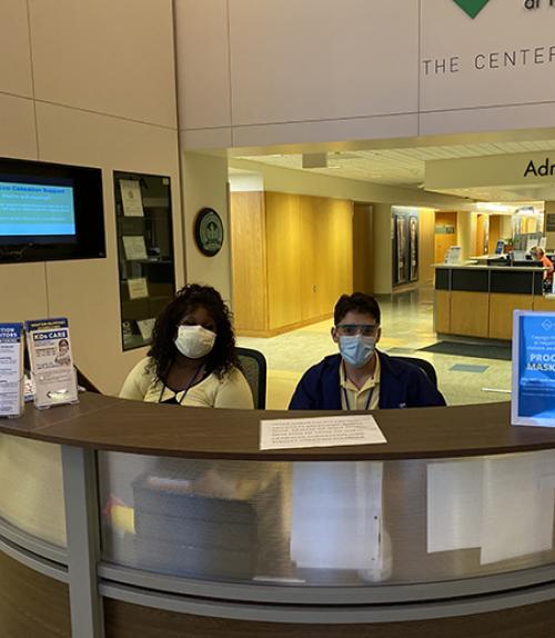 		 Workers with masks at Cayuga Medical Center
	