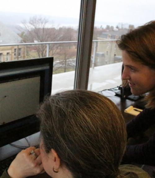  Students gathered around a computer