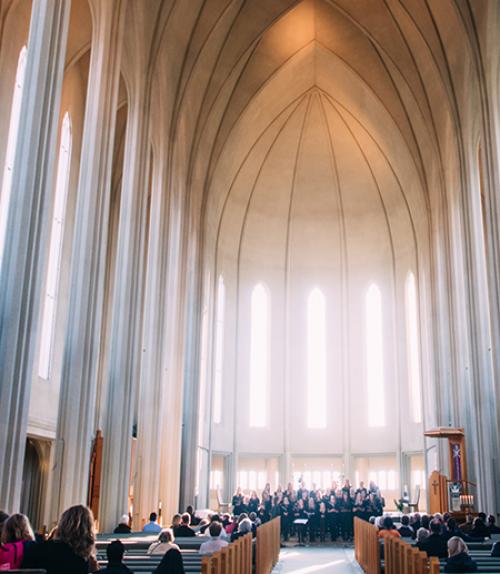 		 people congregated in a vaulted church sanctuary
	