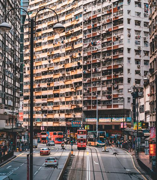  Large apartment buildings on a busy city street
