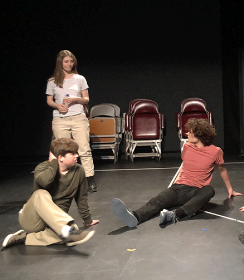  Three actors on a stage