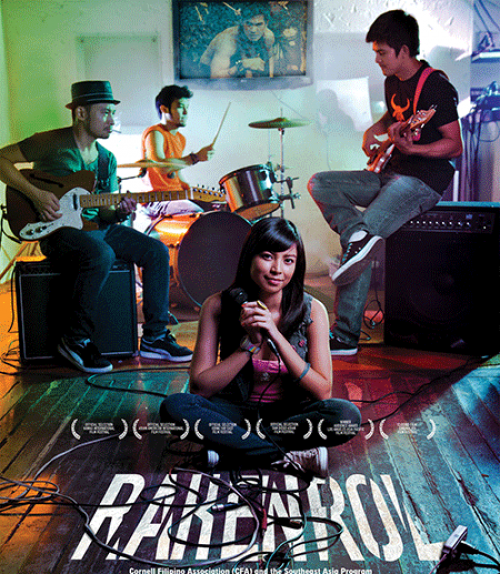 		 Movie poster: person sits crossed legged with band playing behind
	