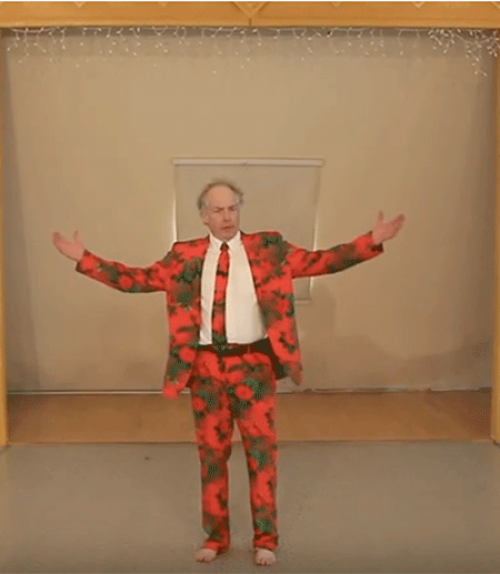  Man wearing a red suit, arms raised