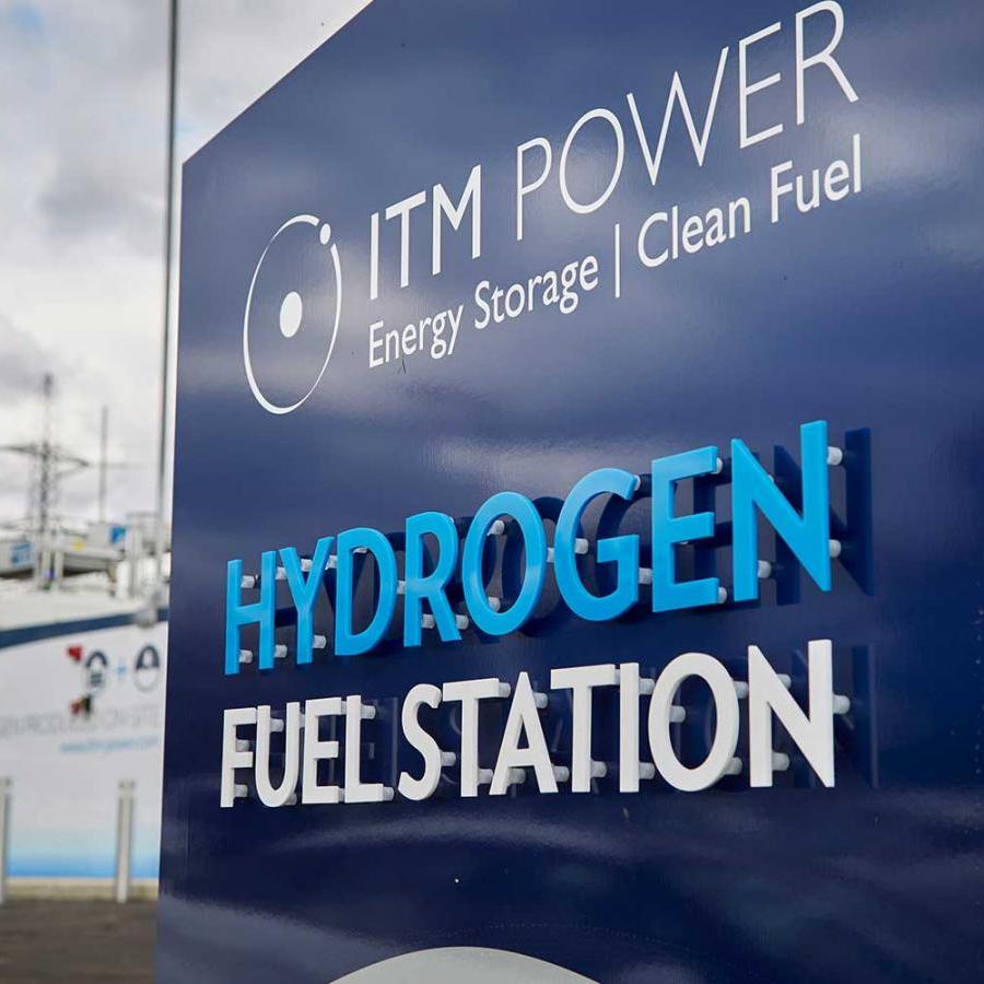 Blue sign: "Hydrogen Fuel Station"