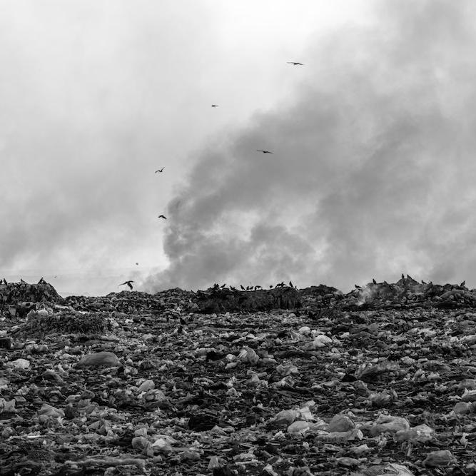 Smoke rising from a landfill