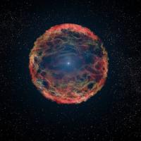 A fiery circle of orange, green and blue against a dark background of space
