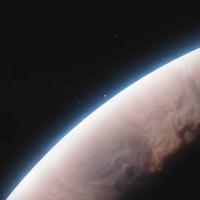 		A pink-tinged crescent edge of a planet with a thin blue layer of atmosphere framed against the black emptiness of space
	