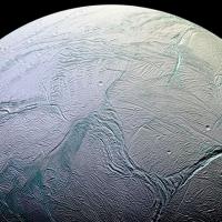 		The frozen ocean world of Enceladus, a moon of Saturn.
	