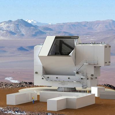 A drawing of the telescope at the mountain site, with a person next to it to show how large it is.