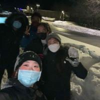 Students with masks on in snow