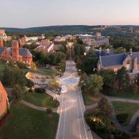 Campus buildings seen from above, in evening light