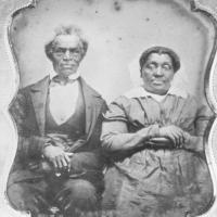 man and woman in black and white photo