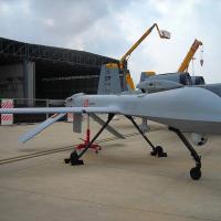 military drone parked on the ground