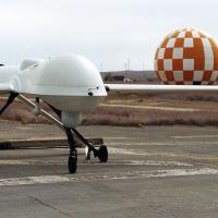 Unmanned aerial vehicle parked on a runway