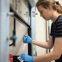 woman with lab equipment