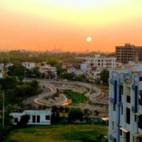 Sun setting over a city