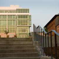 Glass panel building in background with stairs in foreground.