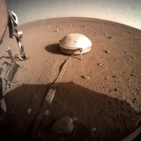 The domed wind and thermal shield covers NASA InSight lander&#039;s seismometer
