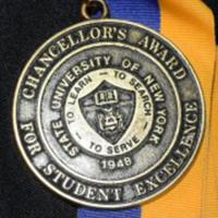 Award medal on blue and gold ribbon