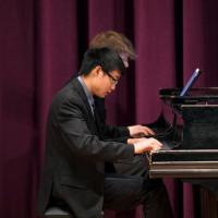 Sheng playing piano