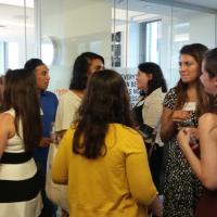 Students at an alumni networking event