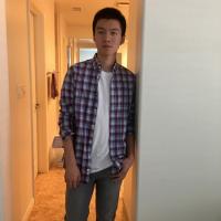 Yunxuan standing in a hallway