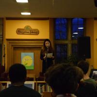  Student reads their poem at Radiant Voices