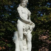  Statue of Bacchus holding bunches of grapes