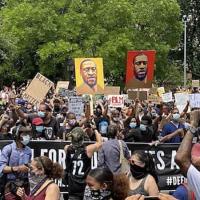  Black Lives Matter protest, masked people holding signs of men who have been killed