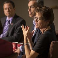 Dean Gretchen Ritter speaking on a panel of participants