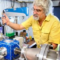 Richard Gillilan, MacCHESS staff scientist, loads a biological sample in preparation for X-rays