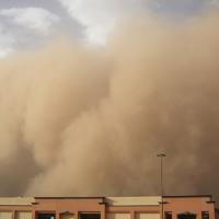  A dust storm engulfs a building