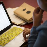 student working on computer
