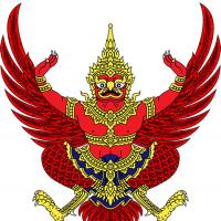  A figure with wings and bird feet and the torso of a man, with Thai jewelry and crown