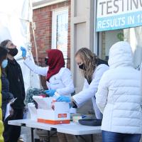  Person administering outdoor medical tests